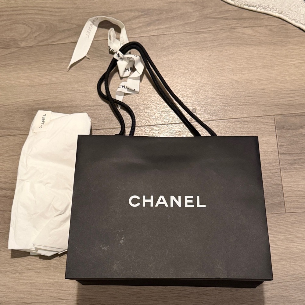 CHANEL Elegant Black Gift Bag with White Accents